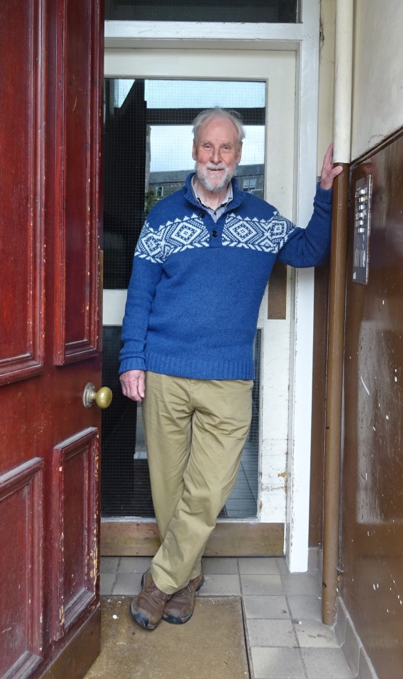 JBM standing in doorway